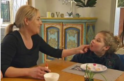 mother and child taking cannabis medicine